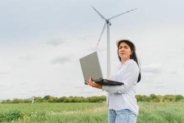 Adobe - female worker clean energy