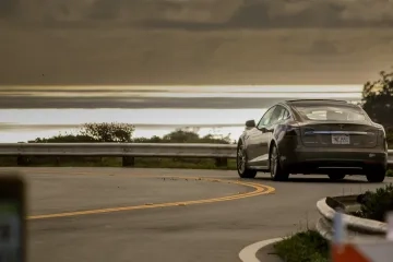 Photo of Tesla by Cameron Earl on Unsplash