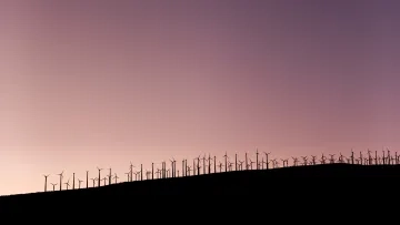 Photo of wind turbines by Kai Gradert on Unsplash