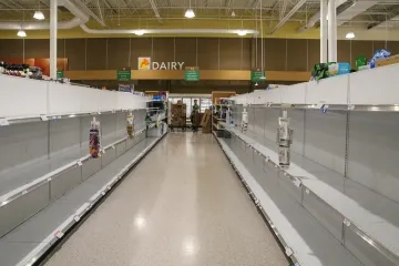 Photo of empty shelves by Mick Haupt on Unsplash