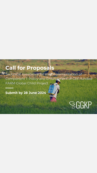 Man spraying pesticides on a field