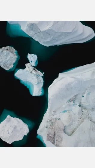 Photo of icebergs melting by Annie Spratt on Unsplash