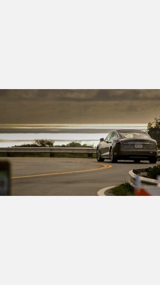 Photo of Tesla by Cameron Earl on Unsplash