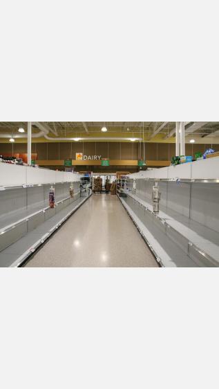 Photo of empty shelves by Mick Haupt on Unsplash