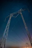 Photo of cables and night sky by Casey Horner on Unsplash