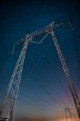 Photo of cables and night sky by Casey Horner on Unsplash